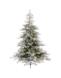 Besneeuwde kunstkerstboom met verlichting